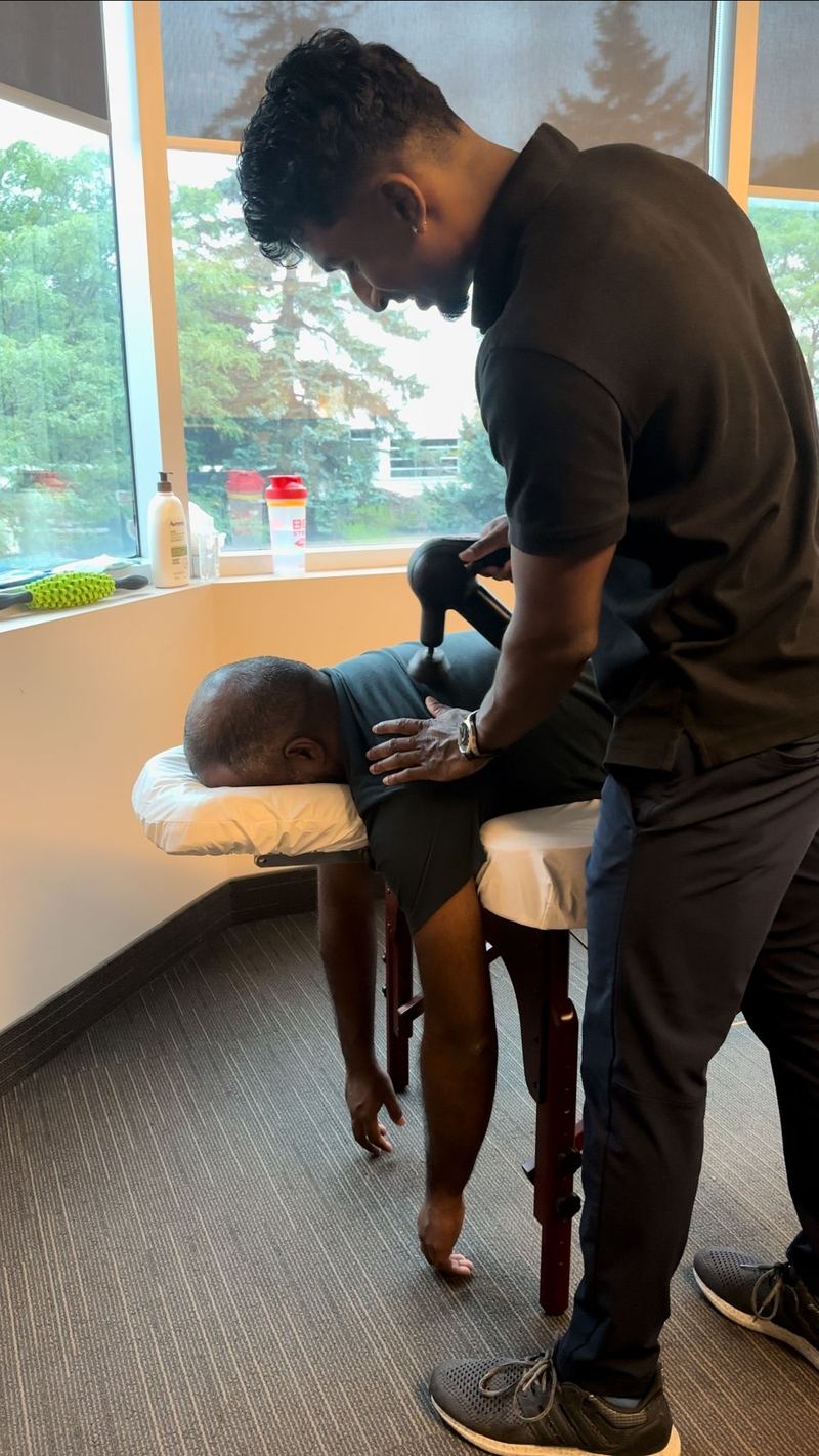 Soft tissue work during an on-site session at a client office